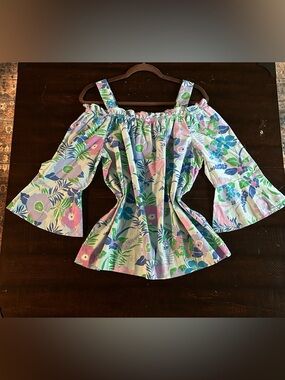 Westbound off-the-shoulder floral blouse.